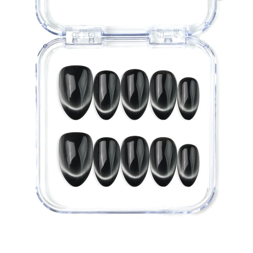 Naillover Midnight Gaze handmade Singapore press on nails in sleek black with soft cat eye shimmer and almond shape.