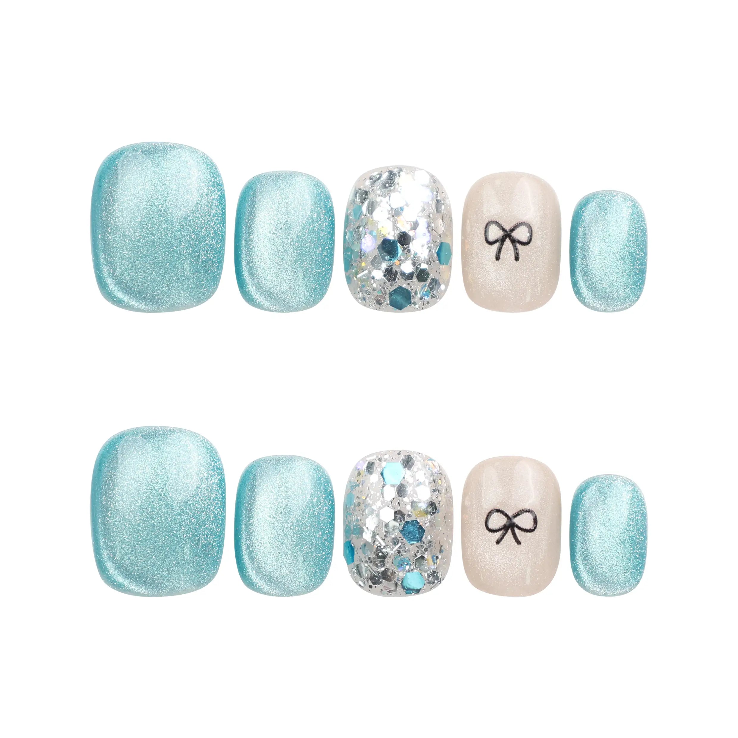 Mint Frost handmade blue shimmer press on nails with crystal accents and bow, Singapore design, displayed on white background by naillover