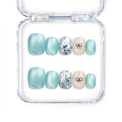 Mint Frost handmade blue shimmer press on nails with crystal accents and bow, Singapore design by naillover