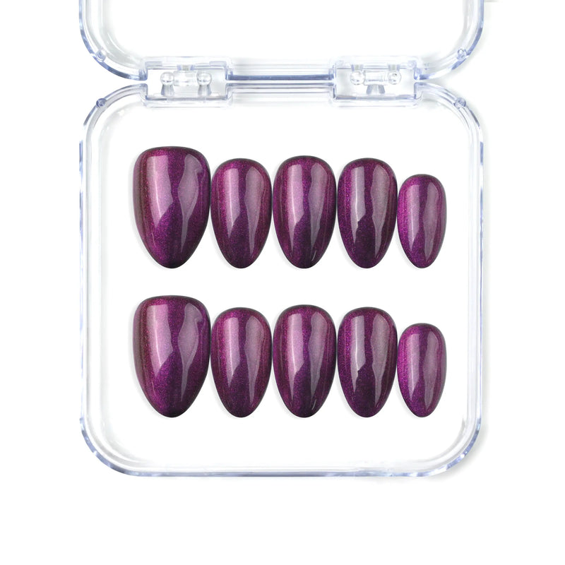 Short almond handmade press on nails in amethyst purple with a cat eye glow by Naillover, Singapore.