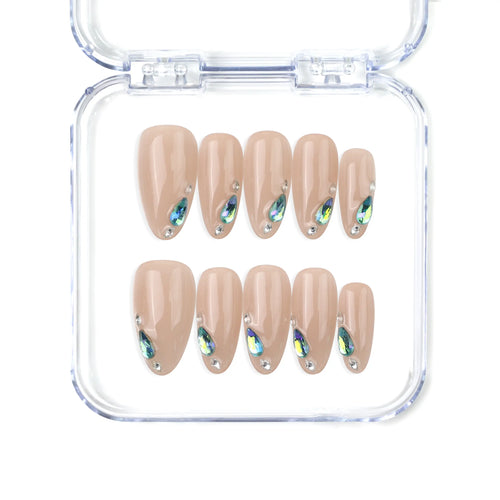 Naillover handmade press on nails with nude base and blue gem tips — Aqua Gem from the Singapore press on nails collection.