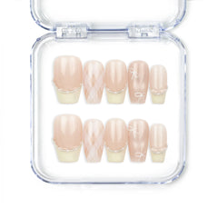 Naillover Ballet Bow handmade Singapore press on nails in soft pink and yellow with bow and pearl accents.