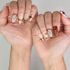 Naillover Blossom Latte Singapore press on nails styled on hand, elegant blend of creamy beige and floral accents