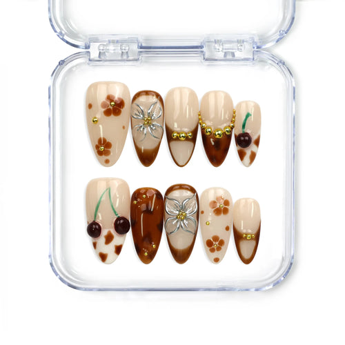 Naillover Blossom Latte Singapore press on nails, handmade beige nails with brown floral designs and gold accents for a chic, classic style