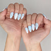 Naillover Blue Floral Diamond trendy nails styled on hands, highlighting coquette nails elegance and sky-blue matte finish