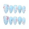 Naillover Blue Floral Diamond handmade press on nails displayed on white background with matte blue base and floral crystal accents