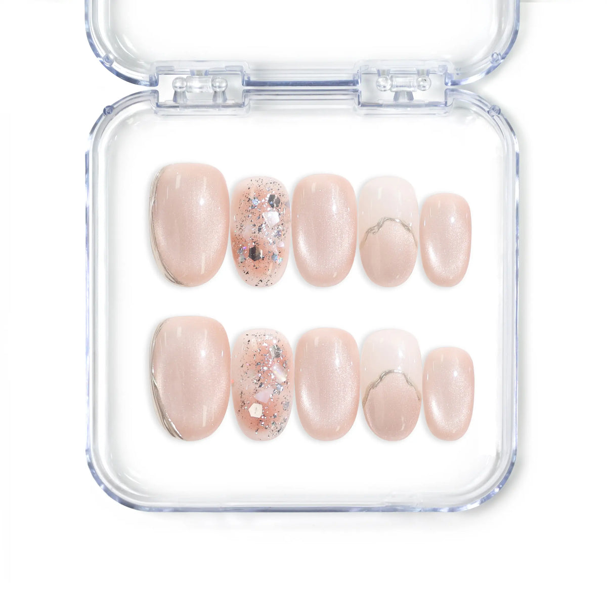 Handmade Singapore press on nails in sheer pink gradient with shimmering silver accents by Naillover.