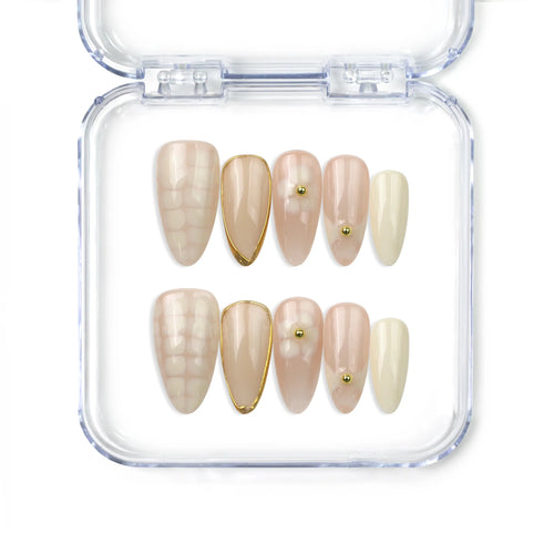 Naillover handmade press on nails in almond shape, featuring blush pink and coral gradient design with subtle lattice detail — summer-ready nails from Singapore.