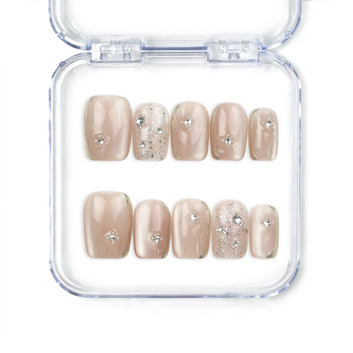 Naillover Chic Shimmer Singapore press on nails with nude base and shimmering gradient, handmade press on nails for a trendy yet classic look