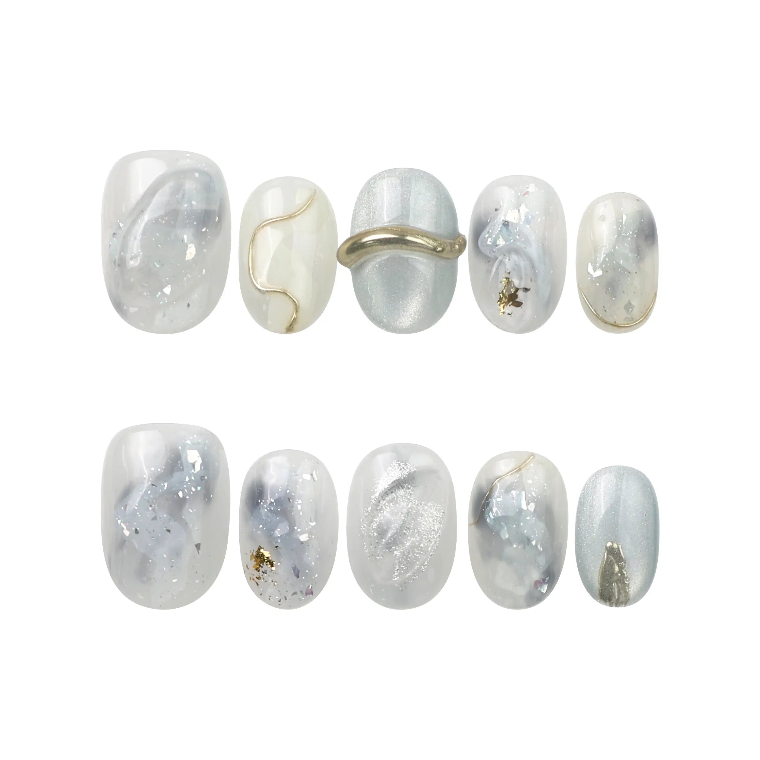 Flat lay of Clear Gleam handmade press on nails by Naillover—white-grey marble nails with gold foil, short square cut.