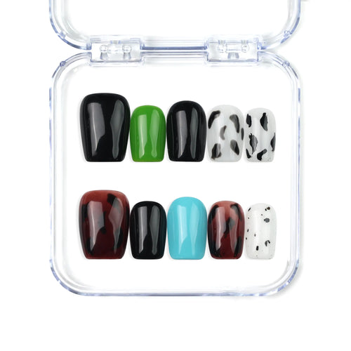 Short coffin handmade press on nails in brown tones with cow print and colorful accents by Naillover Singapore.