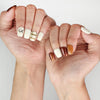 Elegant hand pose with Naillover Cocoa Grid simple nails, highlighting the creamy white and brown color palette.