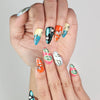 Close-up of Cosmo Glam Singapore press on nails by Naillover featuring bold Y2K colors and playful designs
