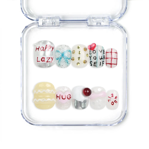 Naillover Cozy Hugs handmade Singapore press on nails with colorful designs, phrases, and 3D accents for a playful nail art look.