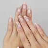 Hand model wearing Naillover Crystal Crescent classic Singapore press on nails with sparkling crystal accent