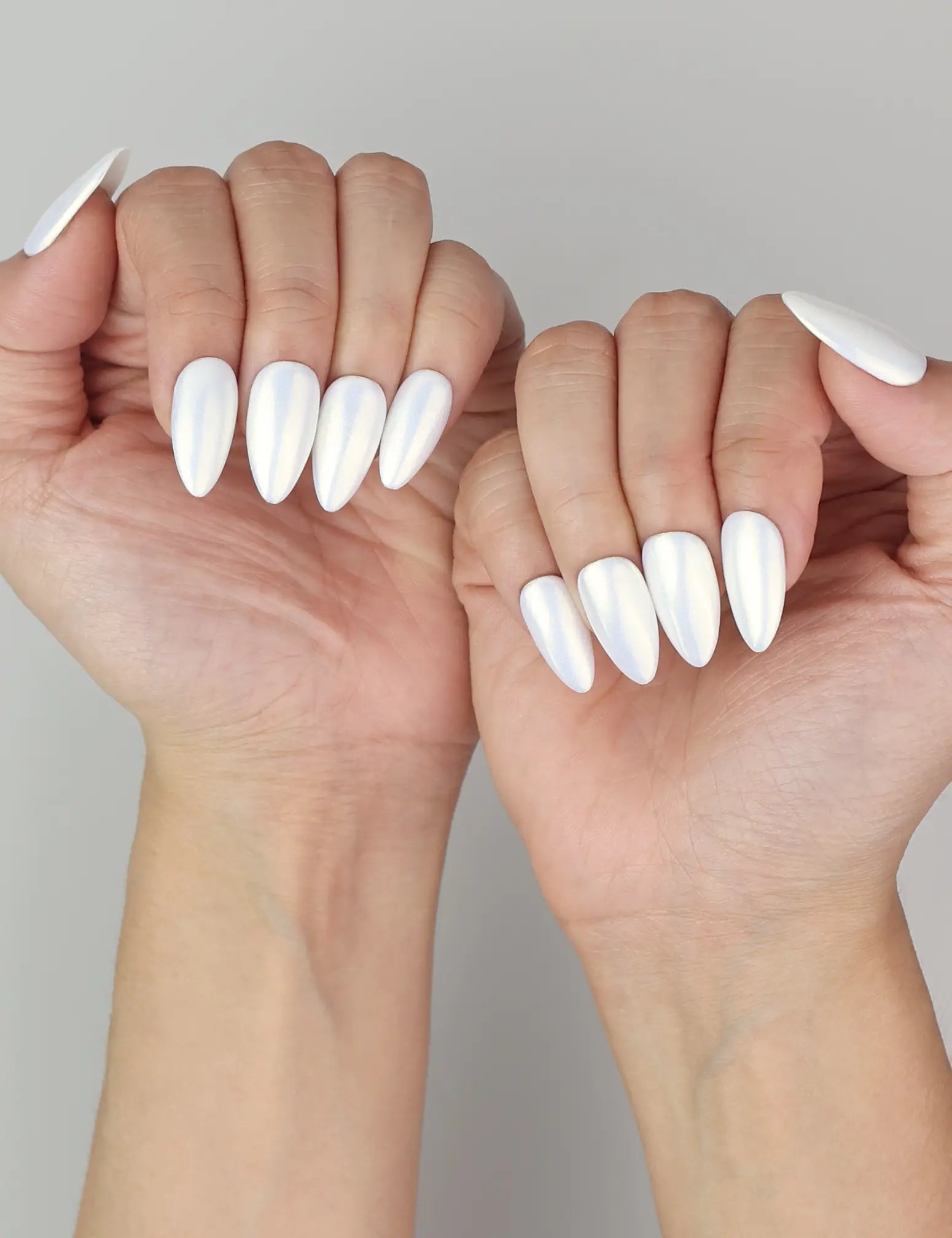 Glacial Glow Singapore press on nails by Naillover, shimmering handmade nails worn elegantly on hand
