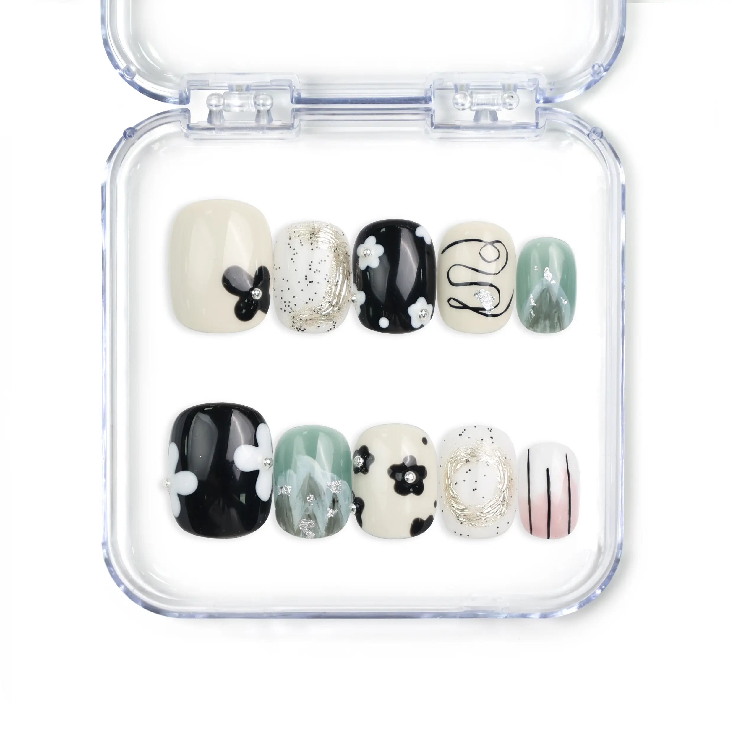 Naillover Inky Blossoms handmade press on nails Singapore in black, white, and green with floral and abstract nail art design.