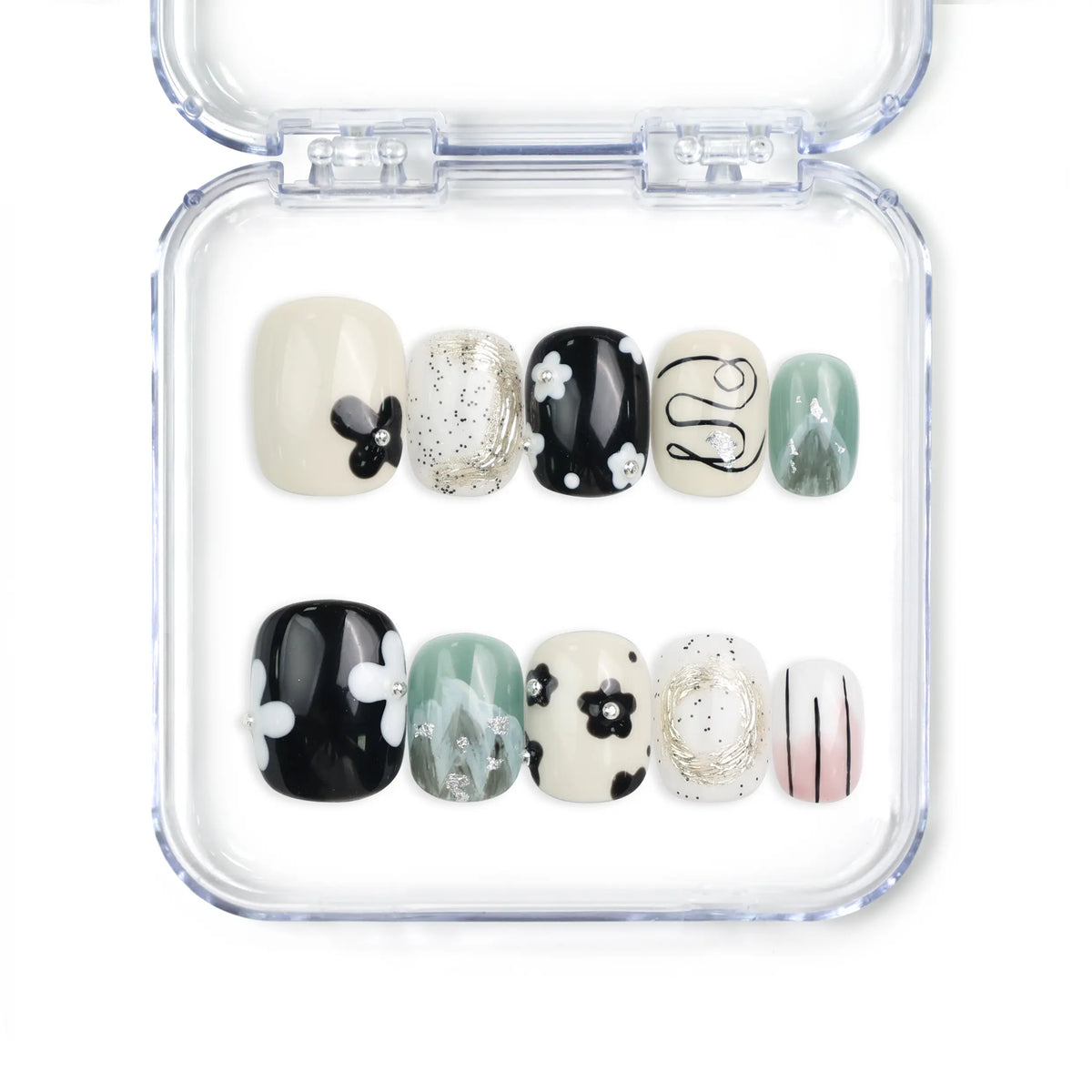 Naillover Inky Blossoms handmade press on nails Singapore in black, white, and green with floral and abstract nail art design.