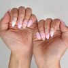 Naillover Lavender Bloom 3D summer nails worn outdoors, sparkling in natural light