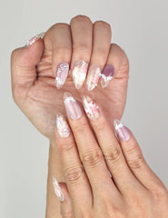 Naillover Lavender Floral Dream Singapore press on nails styled on hand, featuring shimmering butterflies and rhinestones.