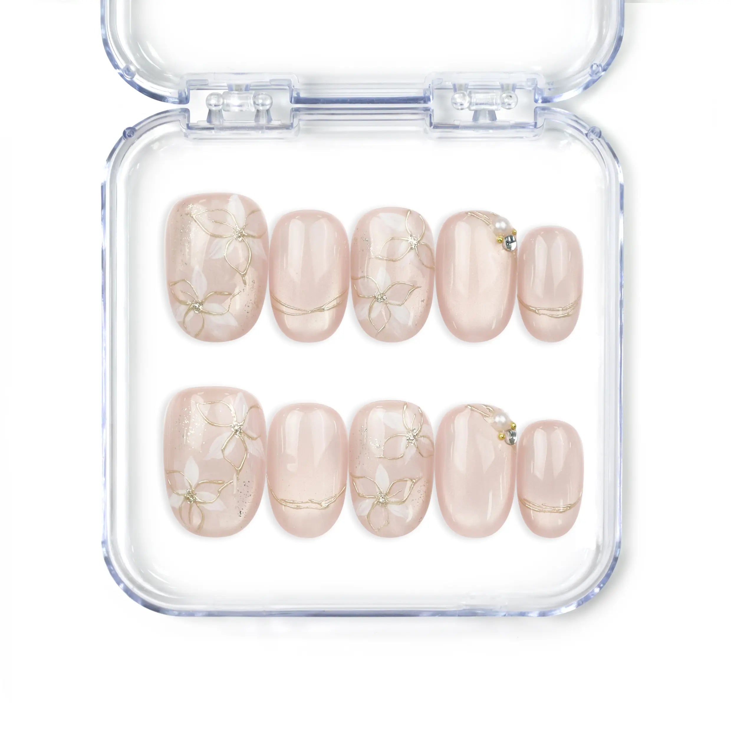 Naillover Lucid Petals handmade Singapore press on nails in soft pink with gold floral motifs and pearls.