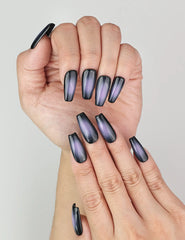 Close-up of Lunar Eclipse handmade press on nails, trendy black and purple gradient style