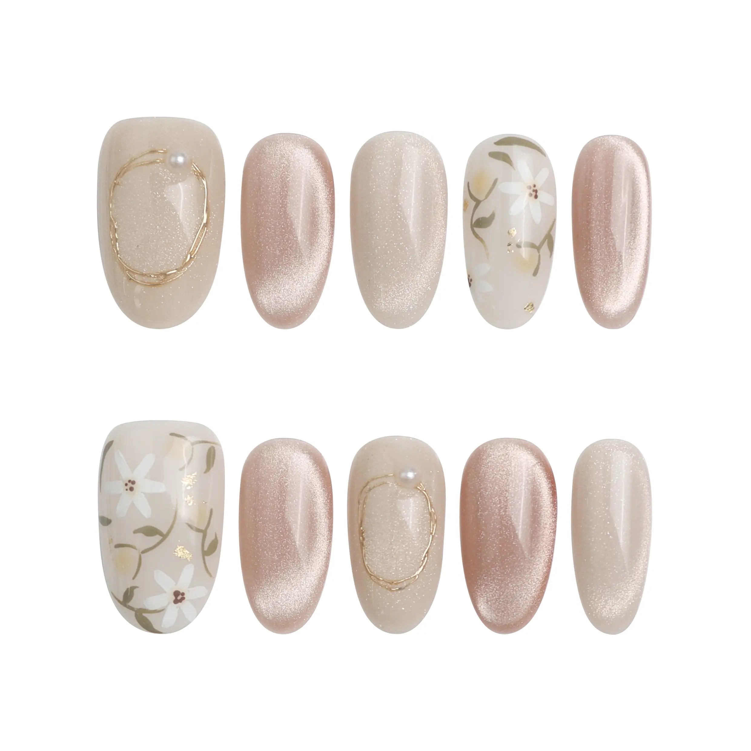 Lunar Petal pink floral press on nails laid out on white background, showcasing gradient and glitter details from Naillover’s handmade Singapore collection.