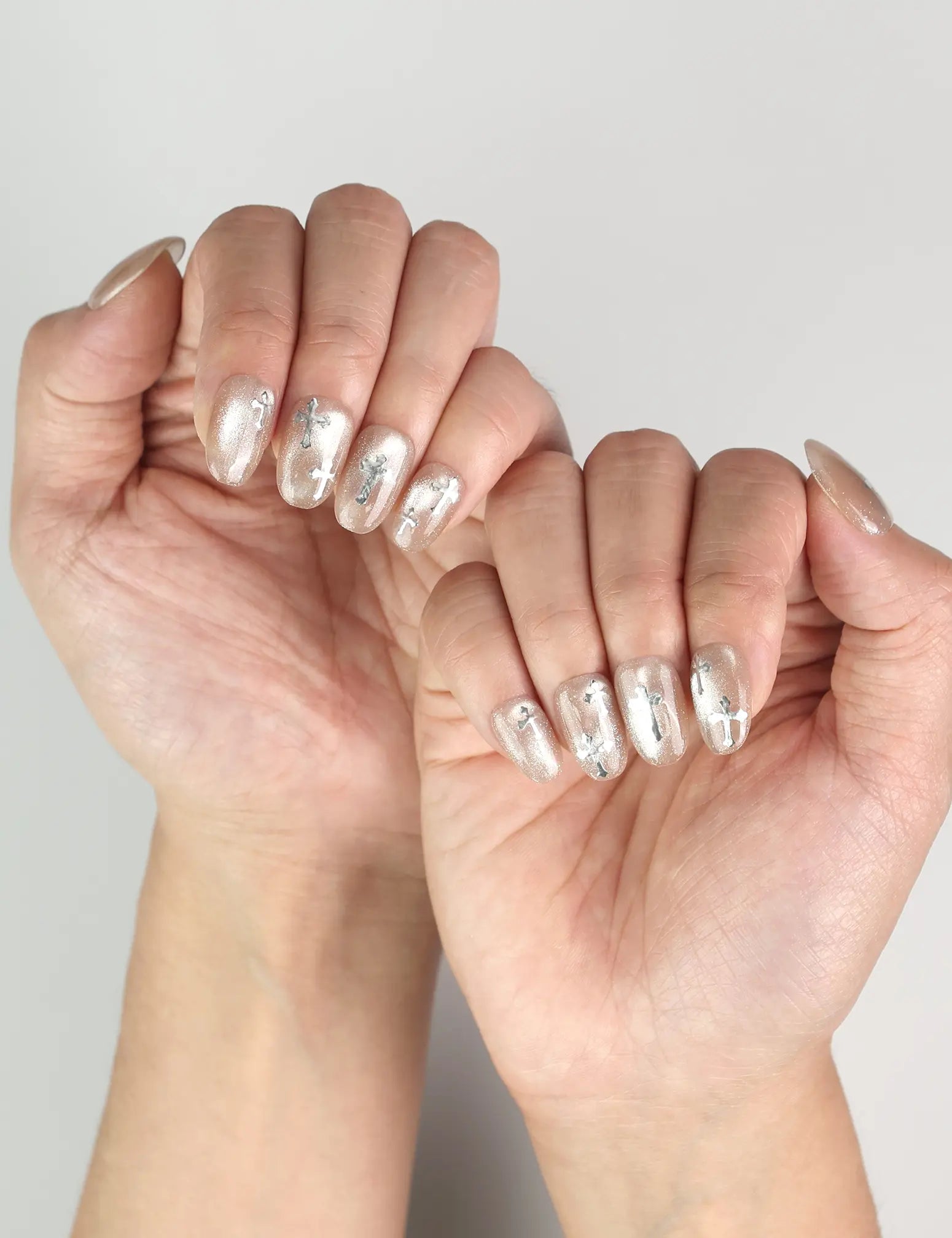 Hand pose showing Naillover Metallic Glam trendy press on nails Singapore, sleek and elegant style