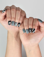 Elegant look of Naillover Mystic Swirl handmade Singapore press on nails styled on model’s hand.