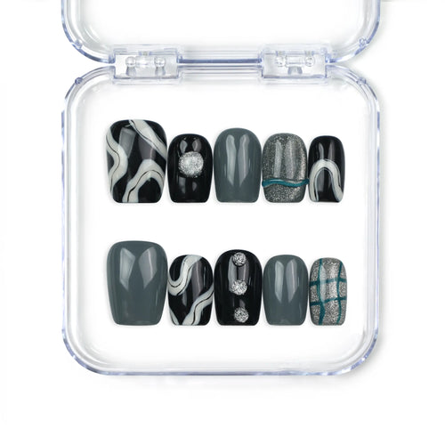 Naillover Mystic Swirl handmade Singapore press on nails in black, grey, and white marble with silver glitter and green stripe accents, classic nails design.