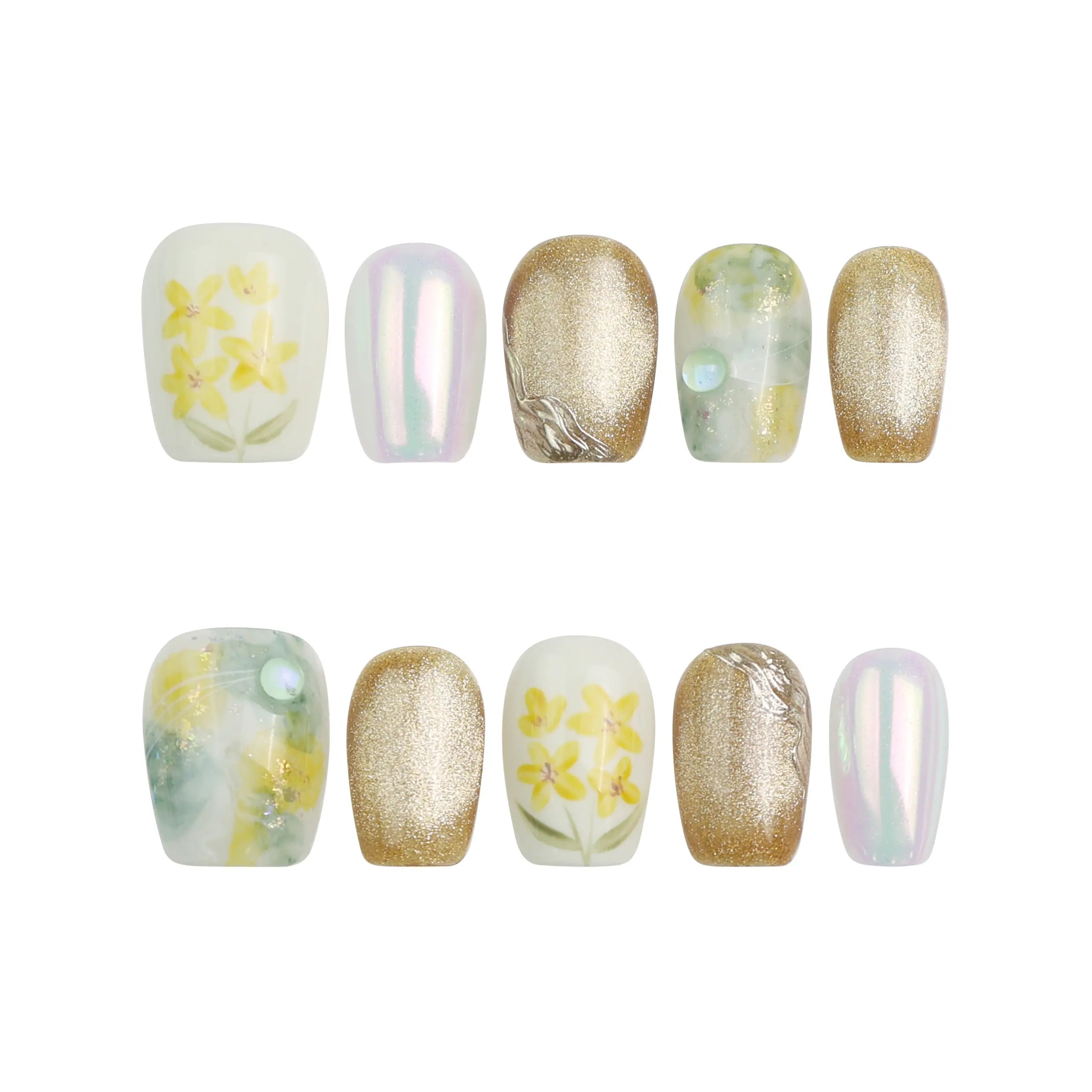 Flat lay of Naillover Nature's Glow handmade press on nails set on a white background, showcasing delicate gold and floral patterns.
