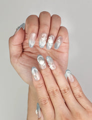 Close-up of Naillover handmade Ocean Whisper press on nails featuring pearl accents and trendy coastal design