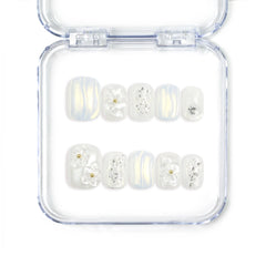 Full set of Naillover Pearl Haze Singapore press on nails featuring 3D white flowers, pearl embellishments, and a translucent handmade finish.