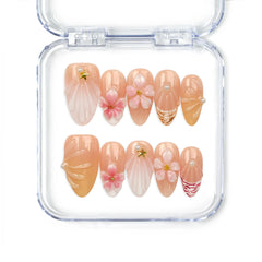 Naillover Pink Ocean 3D Floral handmade press on nails with delicate pink flowers, shell textures, pearls, stars, and gold stripes — elegant Singapore press on nails.