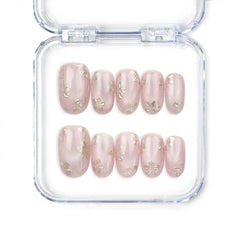 Naillover Rosy Engravings handmade Singapore press on nails in pink with golden floral patterns, designed as elegant trendy nails.
