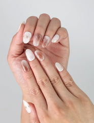 Side view of Naillover handmade Sandy Shine nails, showcasing beachy color gradients and subtle 3D summer nail elements.