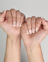 Naillover Serene Loops classic handmade press on nails styled for an elegant everyday look.