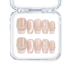 Naillover Serene Loops handmade Singapore press on nails with nude base, pearl accents, and subtle dot details.