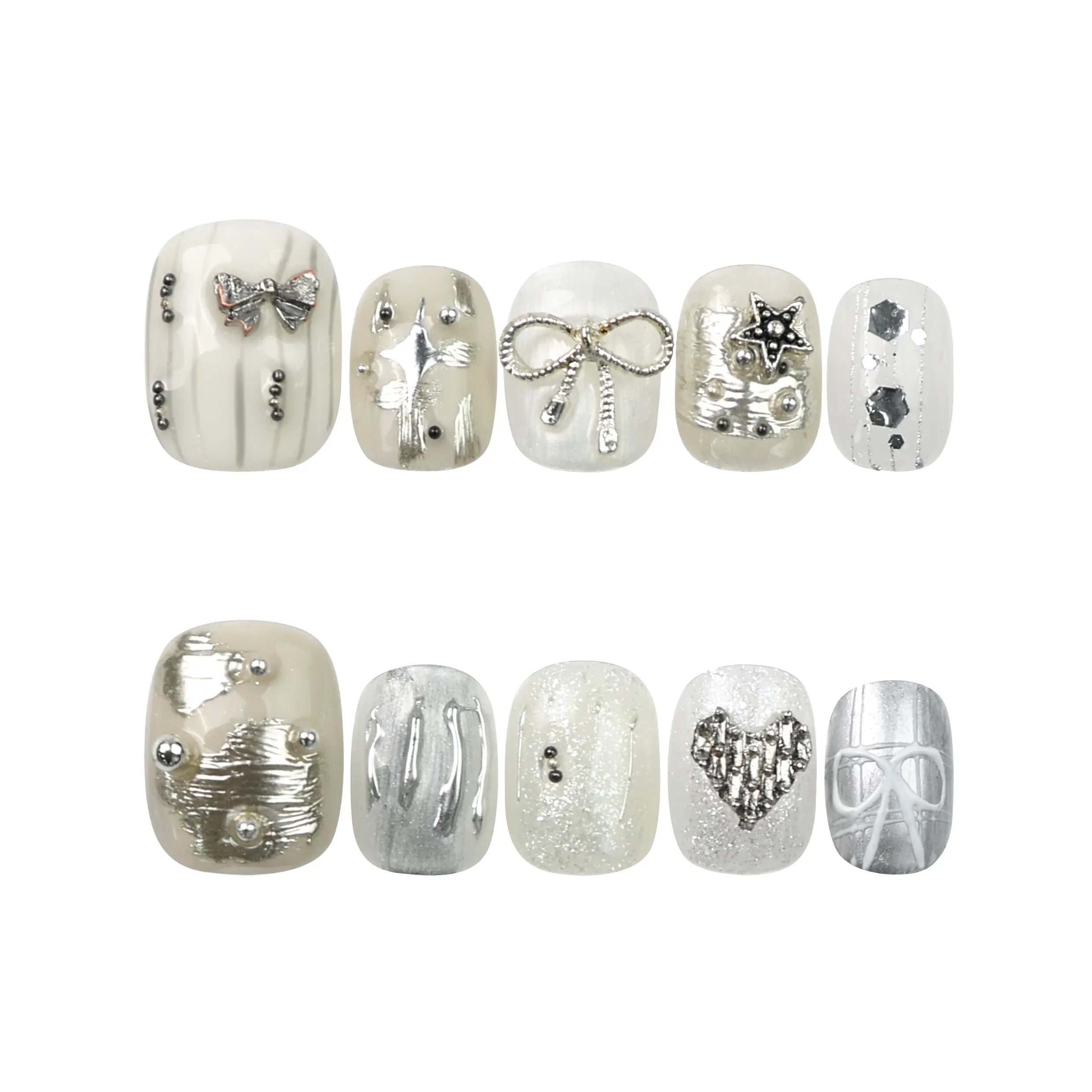 Flat lay of Naillover Silver Bow nails—handmade short press on nails in white with minimal silver detailing, ideal for daily wear.