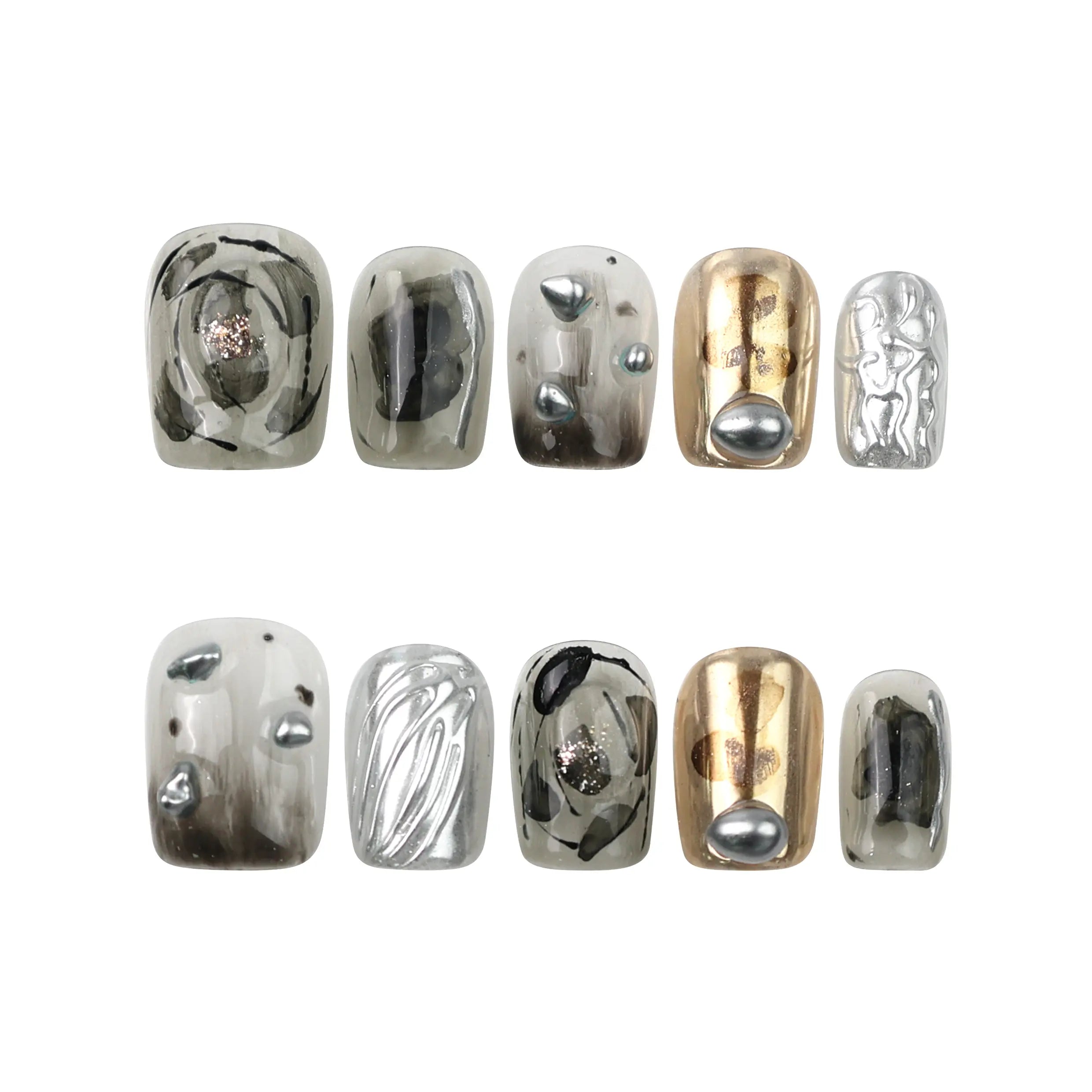 Flat-lay of Naillover Smoky Metal Rush press on nails — handmade design with metallic chrome, marble swirls, and sculpted gray tones.