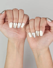 Naillover Sparkling Cream classic cat eye nails styled on hand for an elegant look