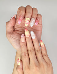 Close-up of Naillover handmade Sweet Pink Yellow 3D Floral Droplet nails showing dotted accents and floral art