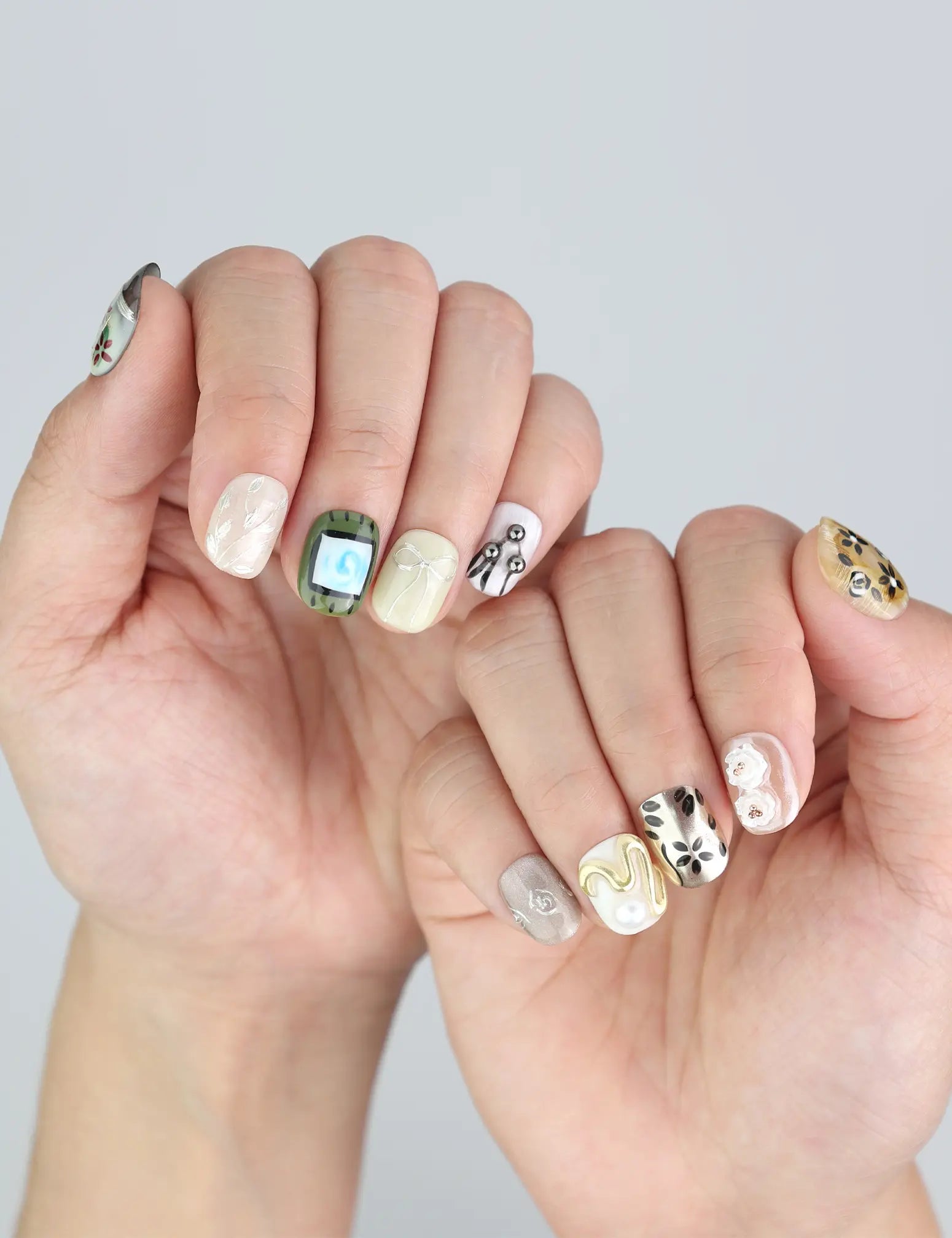 Model showcasing Naillover Vintage Bloom Singapore press on nails—elegant 3D blossoms with a romantic touch.