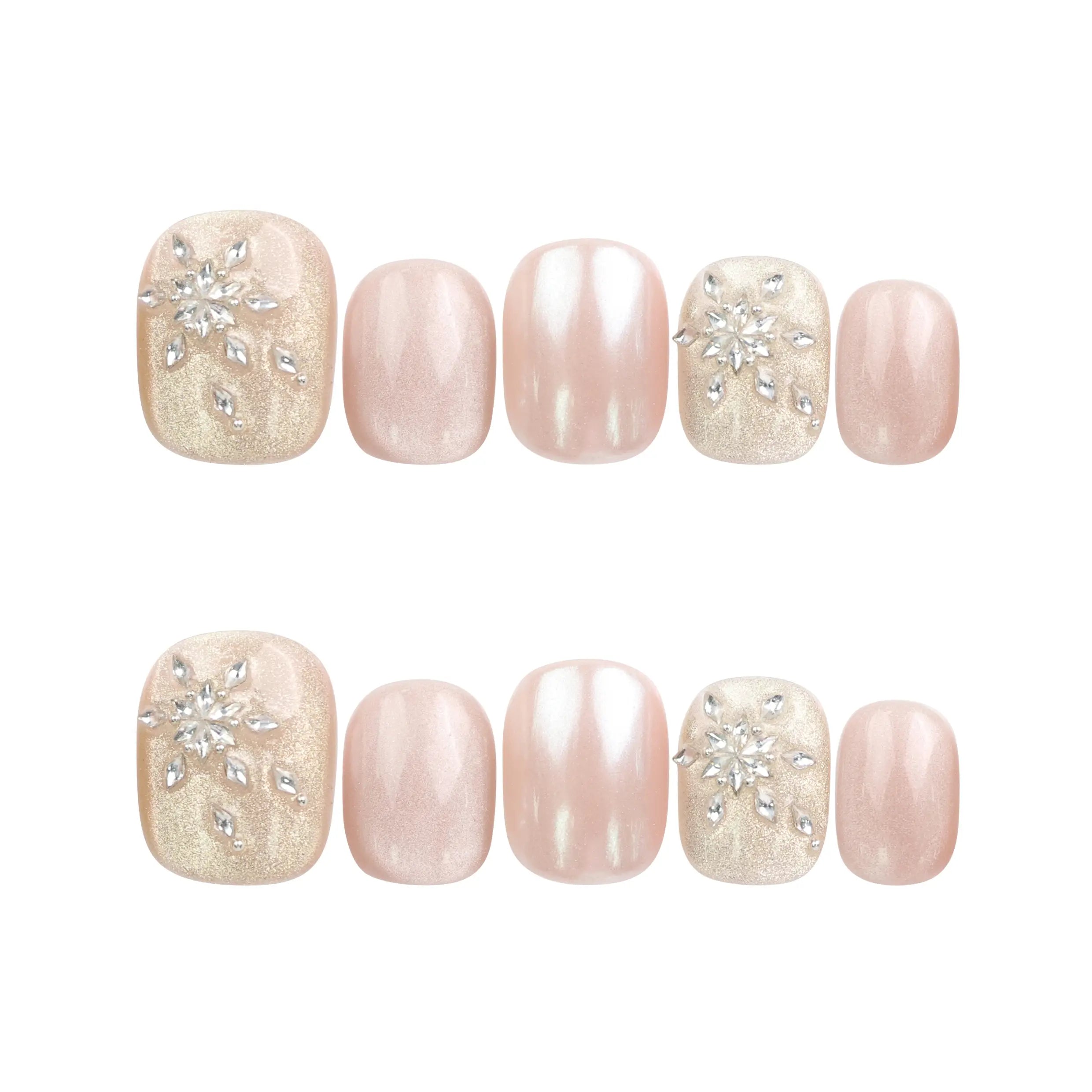 Warm Petal handmade Singapore press on nails by Naillover, pink-to-white ombre design with rhinestone accents, on white background