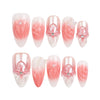 Naillover Whisper of Wisteria press on nails set on white background, featuring blush pink gradient with 3D flowers and butterflies.
