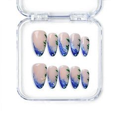 Handmade blue almond press on nails with brushstroke waves and floral art from Naillover, Singapore press on nails collection