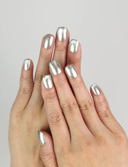 Close-up of Ocean Breeze Singapore press on nails by naillover, cool blue shimmer finish for a trendy summer look.