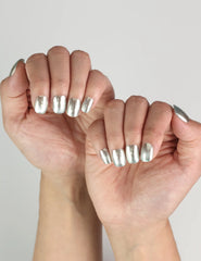 Ocean Breeze Singapore press on nails in blue shimmer, worn for a fresh summer-inspired manicure.