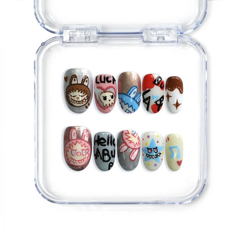 Short pink handmade press-on nails with pastel cartoon art in oval shape, from Singapore brand Naillover.