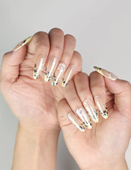 Pearly Blossom Singapore press on nails in beige with leopard and floral details, shown on natural hand
